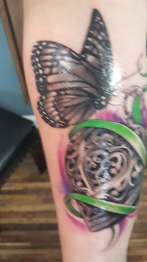 Tattoo Shop «Modern Electric Tattoo and Body Piercing», reviews and photos, 411 S Wesleyan Blvd, Rocky Mount, NC 27803, USA