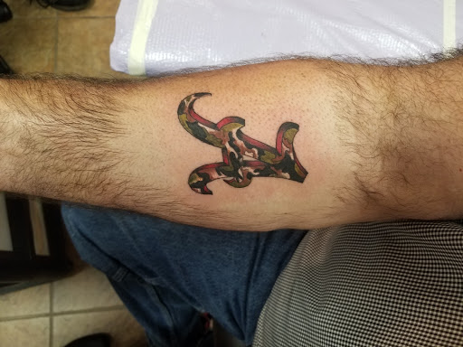 Explore tattoos tramp stamp ideas, creative tattoo ideas in Foley, available at Black Sheep Custom Tattoos and Piercings