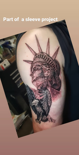 Explore fist tattoo ideas, creative tattoo ideas in Lagrangeville, available at Black Cherry Tattoo Studio NY