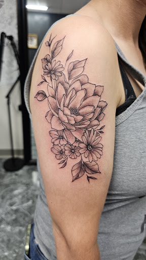 Explore shoulder blade tattoo ideas, creative tattoo ideas in Sumner, available at Spellbound Tattoo LLC