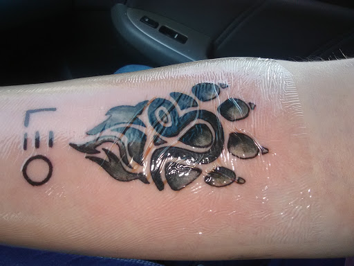 Explore dog sleeve tattoo ideas, creative tattoo ideas in Russellville, available at Black Cross Tattoo