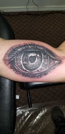 Explore fire and water tattoo ideas, creative tattoo ideas in Angola, available at Hoodlum Ink