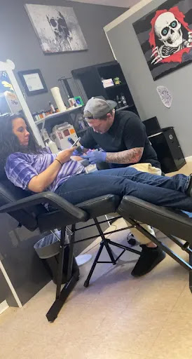 Explore jersey tattoo ideas, creative tattoo ideas in Eden, available at Slicks Tattoo Studio