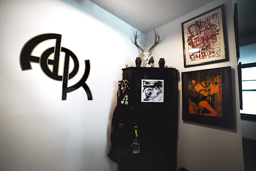 Explore dainty spine tattoo ideas, creative tattoo ideas in Rochester, available at Axe of Kindness Tattoo