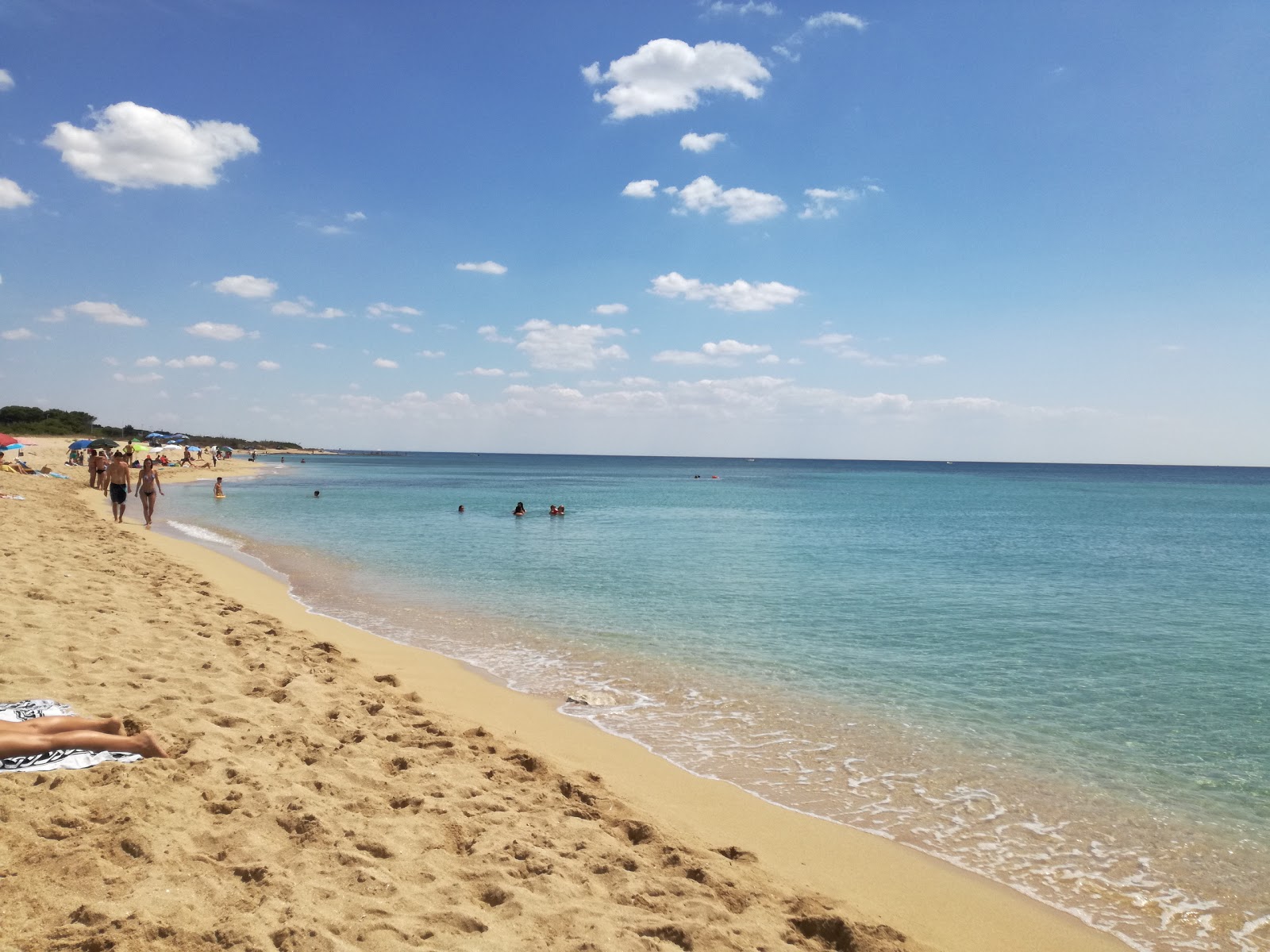 Foto av Spiaggia di Borraco med lång rak strand