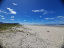 Foto di Praia Maruja con costa lunga e dritta