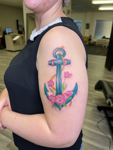 Explore cover up tattoo ideas for men, creative tattoo ideas in Watford City, available at Soulful Ink Studios