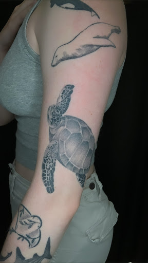 Explore dragonfly tattoo ideas, creative tattoo ideas in Cadillac, available at Limitless Ink Tattoo Studio