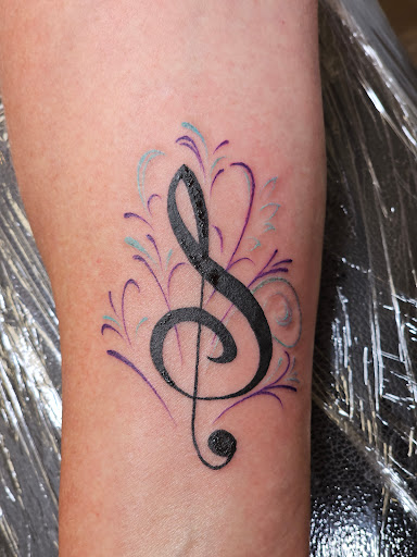 Explore in memory of dad tattoo ideas, creative tattoo ideas in Davenport, available at Fine Ink Studios Tattoos