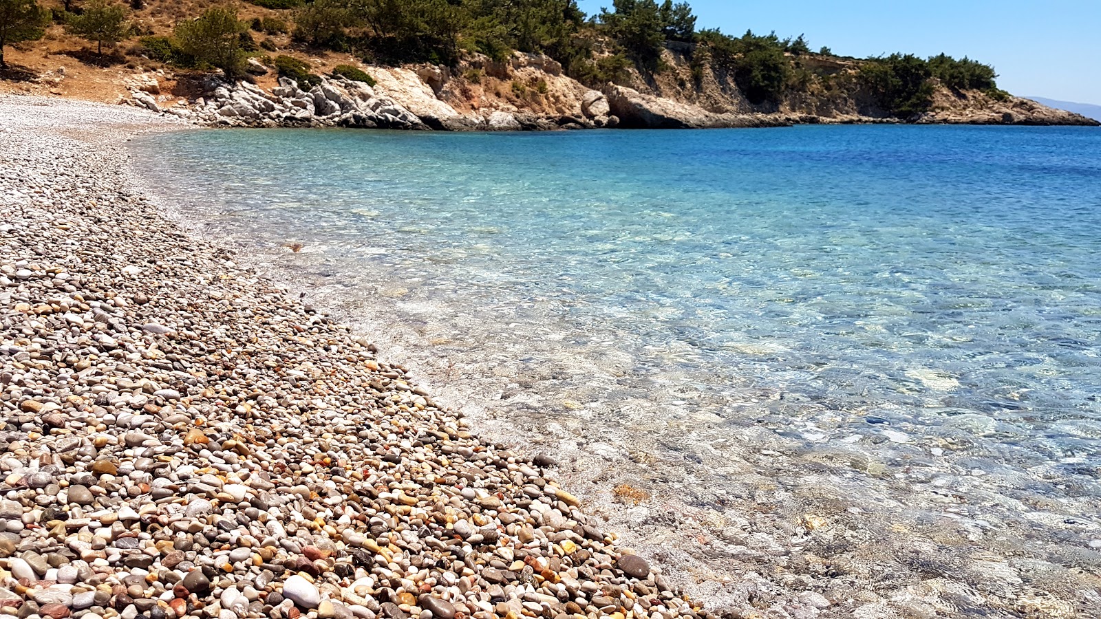 Foto van Tigani Beach wilde omgeving