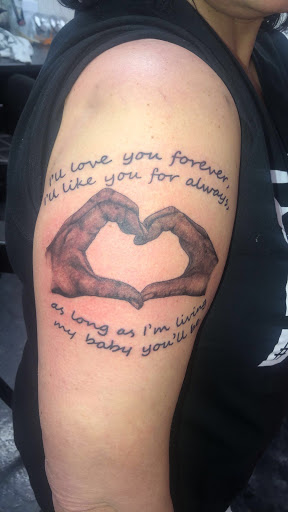 Explore santa muerte tattoo ideas, creative tattoo ideas in Poplar Bluff, available at The Marked Bar Music Venue