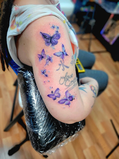 Explore meaningful finger tattoo ideas, creative tattoo ideas in Benton, available at Spectrum Tattoo