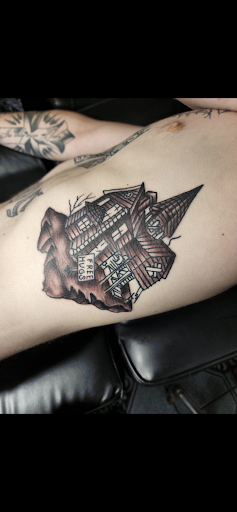 Tattoo Shop «Wizard Tattoo Studio», reviews and photos, 5780 S M L King Jr Pkwy, Beaumont, TX 77705, USA