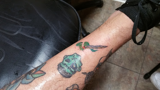 Explore cover up tattoo ideas back, creative tattoo ideas in Scranton, available at Slingin Ink tattoo & piercing