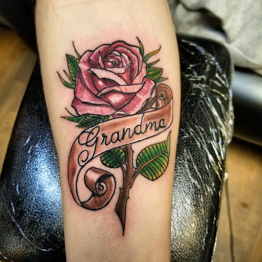 Explore unique hand tattoo ideas, creative tattoo ideas in Cumberland, available at Queen City Ink