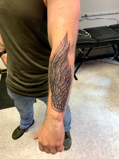 Explore unique sleeve tattoo ideas, creative tattoo ideas in Hudson Falls, available at ALTERED ADDICTION TATTOOS