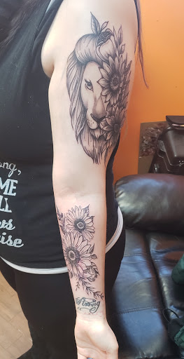 Find tattoo ideas roses for your next unique tattoo in Bessemer City at Twisted Ink