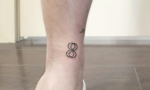 Explore motley crue tattoo ideas, creative tattoo ideas in Sunnyvale, available at Greego tattoo