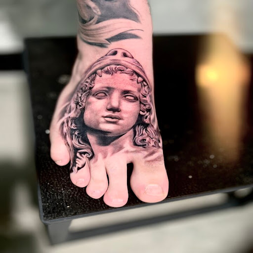 Explore globe tattoo ideas, creative tattoo ideas in Sherman Oaks, available at Costello Tattoo & Piercing Studio