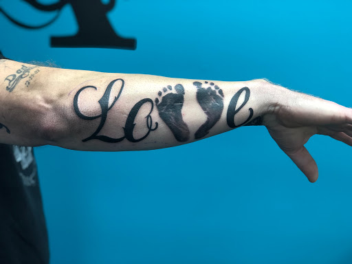 Explore mens tattoo ideas upper arm, creative tattoo ideas in Lockport, available at Archer Ink Tattoo