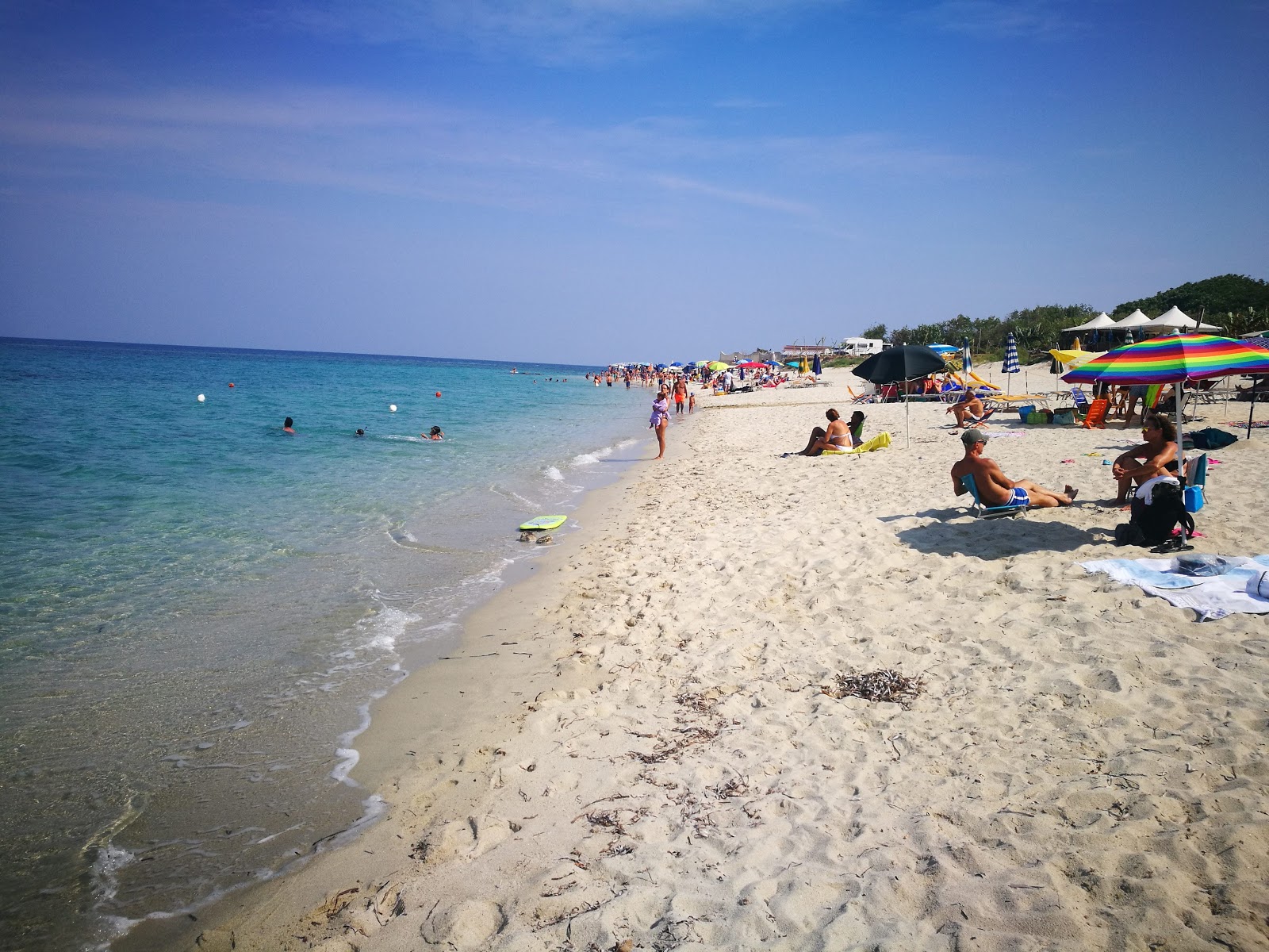 Photo de Plage de Formicoli avec l'eau bleu de surface