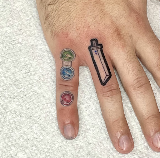 Find beach scene tattoo ideas for your next unique tattoo in Wilmington at Rogue Tattoo Studio