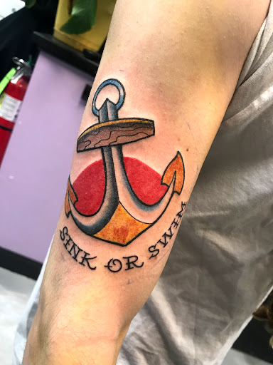 Explore religious cross tattoo ideas, creative tattoo ideas in Lake Bluff, available at Evolution Body Arts