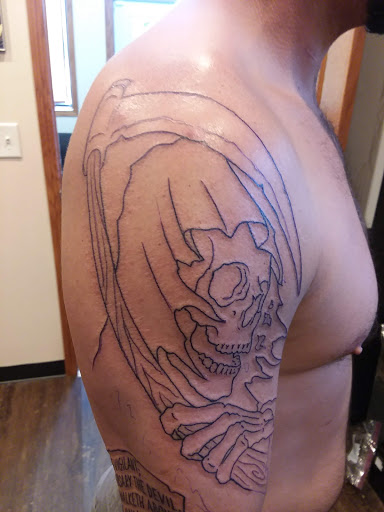 Explore dissociation tattoo ideas, creative tattoo ideas in Des Moines, available at Hooligan Tattoo