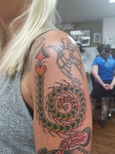 Tattoo Shop «Name Brand Tattoo», reviews and photos, 514 E Washington St, Ann Arbor, MI 48104, USA