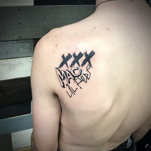 Explore throat tattoo ideas for females, creative tattoo ideas in Abington, available at Ink Boss Tattoo & Piercing Studio