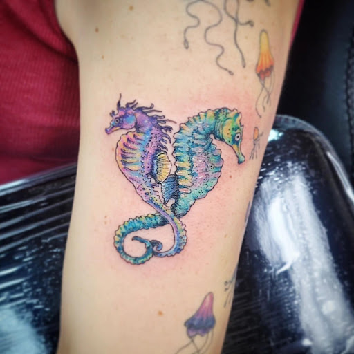 Explore hand tattoo ideas for females, creative tattoo ideas in Kenosha, available at Kenosha Tattoo Company