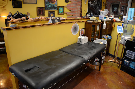 Explore pink floyd tattoo ideas, creative tattoo ideas in Oak Grove, available at NeverMore Galleries Tattoo Studio