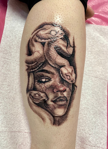 Explore half sleeve tattoo ideas male, creative tattoo ideas in Lake City, available at Crooked Spines Tattoo Studio