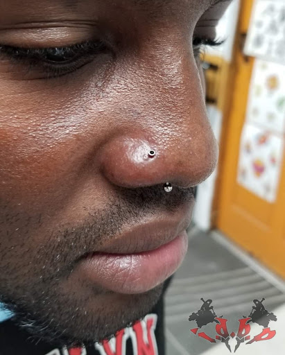 Explore marriage ring tattoo ideas, creative tattoo ideas in Staten Island, available at WDBP Services LLC