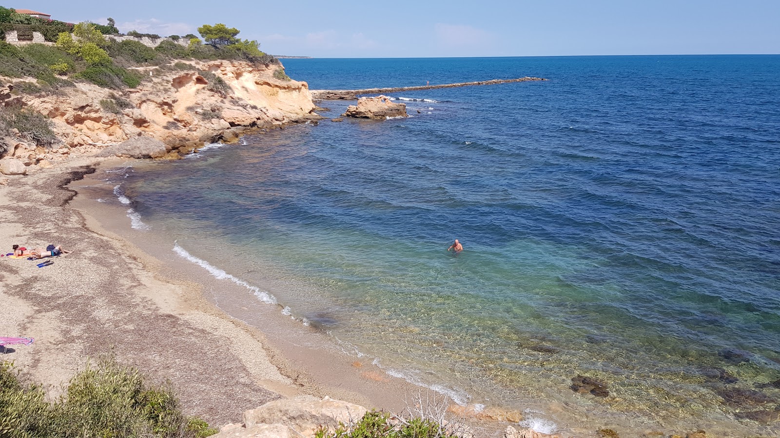 Foto von Playa del Bacone mit felsiges gelände Oberfläche
