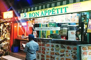 Bon Appetit Bakes Fries Grills Roasts Restaurant. WAFFLES, Crunchy POPCORNS, Freshly Brewed bean based Coffee, KULHAD PIZZA. image