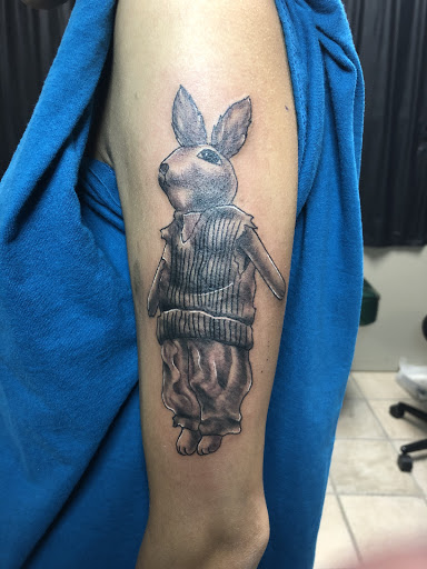 Explore infant loss tattoo ideas, creative tattoo ideas in Alamogordo, available at The Poison Frog Tattoo Studio