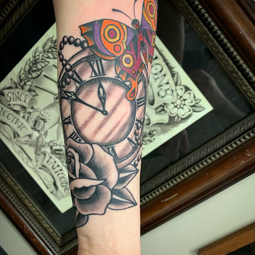 Explore clock tattoo idea, creative tattoo ideas in Strasburg, available at Champion Tattoo Company