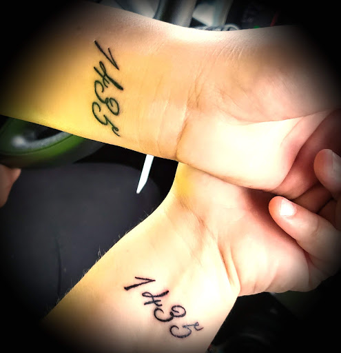 Explore mens rose tattoo ideas, creative tattoo ideas in Saginaw, available at Hourglass Piercing Studio