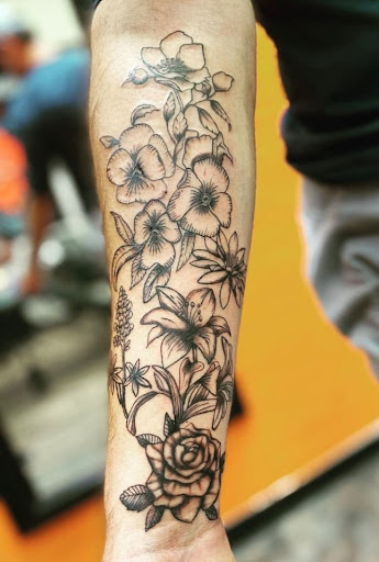 Explore skull hand tattoo ideas, creative tattoo ideas in Mesa, available at Ranger Tattoo & Piercing