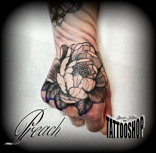 Explore womens hand tattoo ideas, creative tattoo ideas in Wasilla, available at Doulos Tattoo, The Tattoo Shop