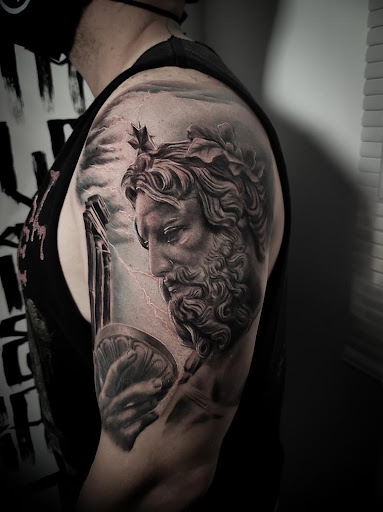 Explore dark angel tattoo ideas, creative tattoo ideas in Goose Creek, available at Red Kirin Tattoo