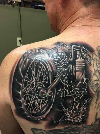 Explore shoulder tattoo ideas for guys, creative tattoo ideas in Fargo, available at Golden Dragon Tattoo