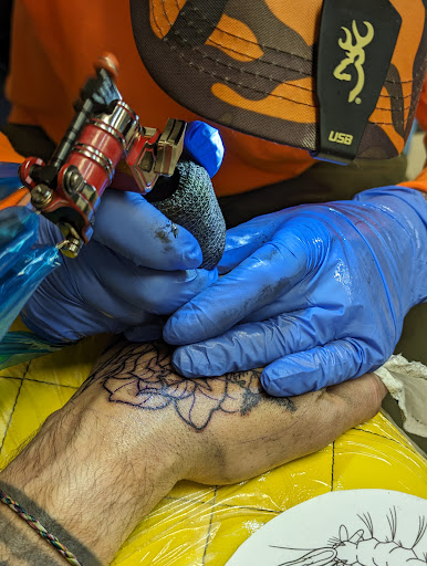 Explore mens spine tattoo ideas, creative tattoo ideas in Laramie, available at Rolling Tattoo