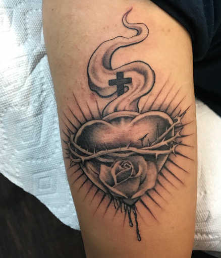 Explore camera tattoo ideas, creative tattoo ideas in San Antonio, available at Firme Copias Tattoo Studio