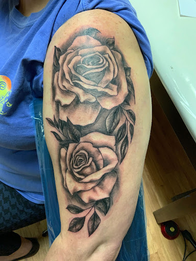 Explore filler tattoo background ideas, creative tattoo ideas in Hartford, available at Tat2s Inked & Restored