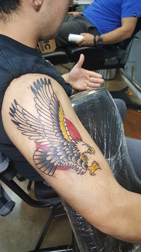 Explore shoulder tattoo ideas for guys, creative tattoo ideas in Arlington, available at Urbans Tattoo & Piercing Studio