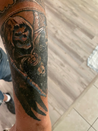 Explore blackout sleeve tattoo ideas, creative tattoo ideas in Venice, available at The Beehive Tattoo Studio and Boutique