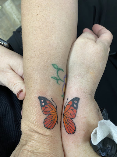 Explore tattoo ideas for daughter, creative tattoo ideas in Buford, available at Wild Tribe Tattoos and Piercings