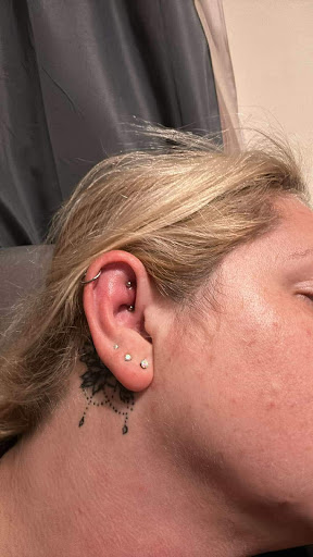 Explore dark feminine tattoo ideas, creative tattoo ideas in Milwaukee, available at Avant-Garde